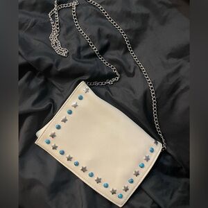 Faux leather purse with turquoise studs